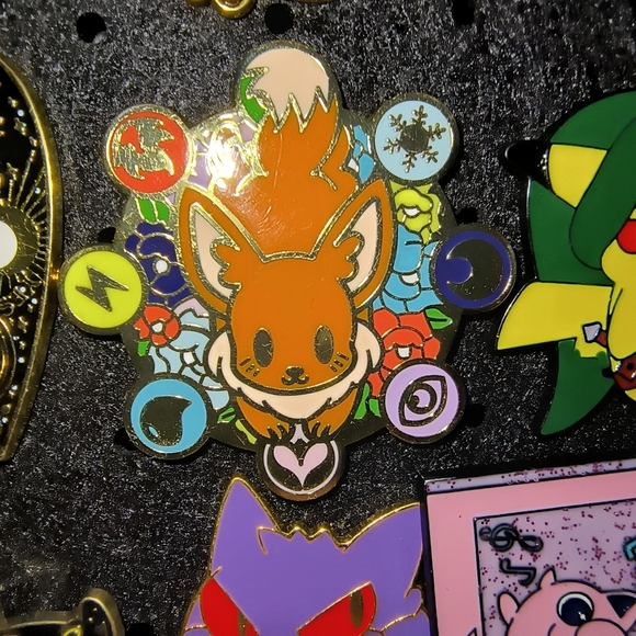 Pokemon Accessories - Pokemon Eevee Enamel Pin in Orange, Cream, Blue, Purple and Yellow